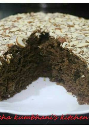 A picture of Eggless Roasted almond chocolate cake.