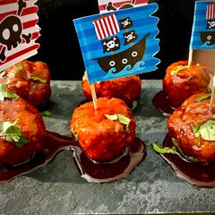 A picture of Turkey Lollipop in Sriracha Sauce.