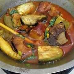 A picture of Woku kemangi ikan asap dan terong.