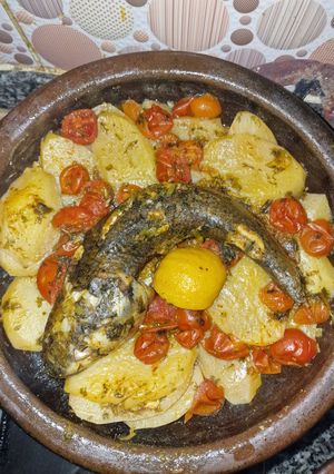 A picture of Moroccan Baked Fish Tagine with Potatoes & Cherry Tomatoes.