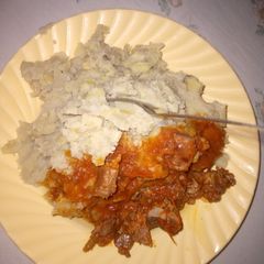 A picture of Matoke and meat. Sweet dish for any time of the week and day.