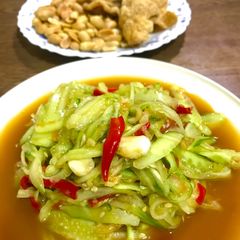 A picture of Som tam Tang(Cucumber spicy salad).