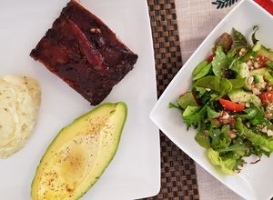 Una foto de Costillitas Barbecue Al Ron, Jengibre y Panela (Baby Back Ribs)