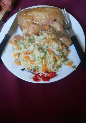 Una foto de Muslo con arroz 🍗🍚