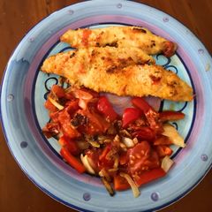 A picture of Fried Fish with side dish.