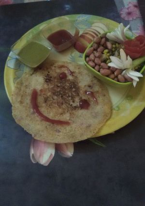 A picture of Sprouts bhel with moonghphali and anar ke dane and Suzi ke veggies chila.