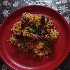 A picture of Hyderabadi Chicken Biryani.