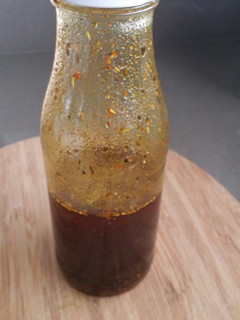 Una foto de Aceite especiado para aliñar carnes