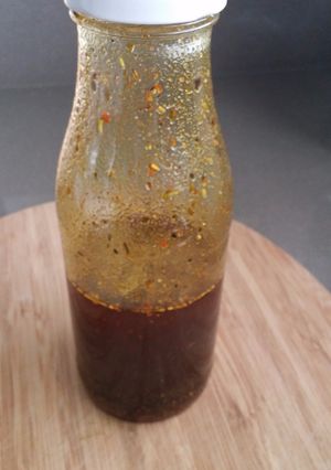 Foto principal de Aceite especiado para aliñar carnes