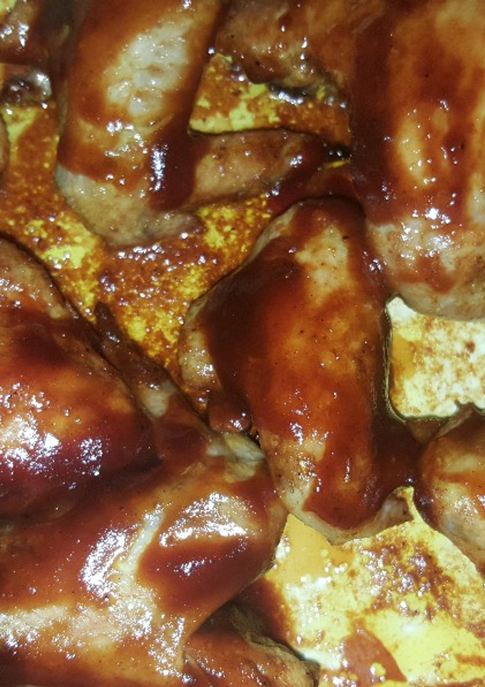 Una foto de Alitas de pollo horneadas con salsa BBQ