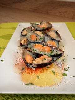Una foto de Patatas con mejillones