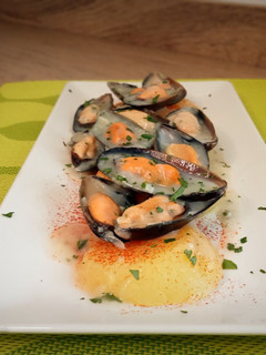 Una foto de Patatas con mejillones