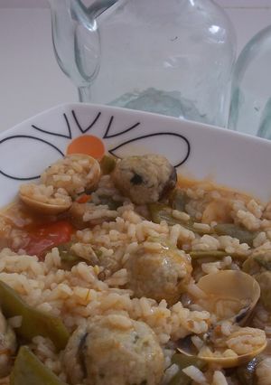 Foto principal de Arroz meloso del mar con albóndigas de boquerones