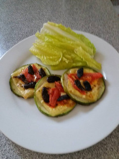 Una foto de Aperitivo pizzeta de zapallo italiano