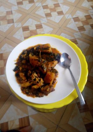 A picture of Yam porridge with vegetable.