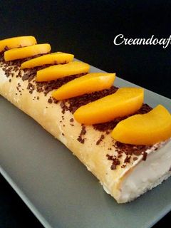 Una foto de Brazo de tiramisú de melocotón