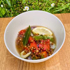 A picture of Greek Fakes Soupa - lentil and summer veggie soup 🌱.