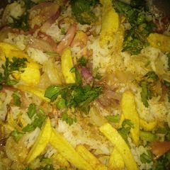 A picture of Veg biryani with smoky effect.