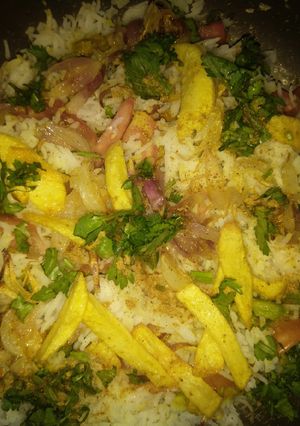 A picture of Veg biryani with smoky effect.
