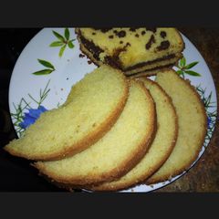 A picture of Vanilla cake with chocolate sauce*.