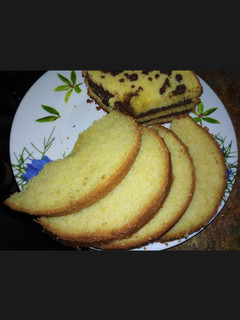 A picture of Vanilla cake with chocolate sauce*.