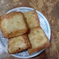 A picture of Corn chicken box samosy.