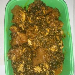 A picture of Egusi(Melon)Soup with Cow leg.