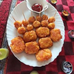 A picture of Rice potato cheese corn cutlets/ more little bits.