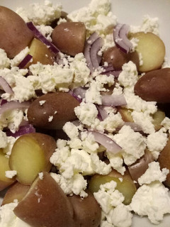 A picture of Potato and feta salad.