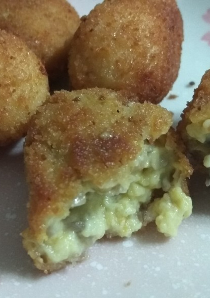 Una foto de Croquetas de setas, calabaza y toque de queso grana padano