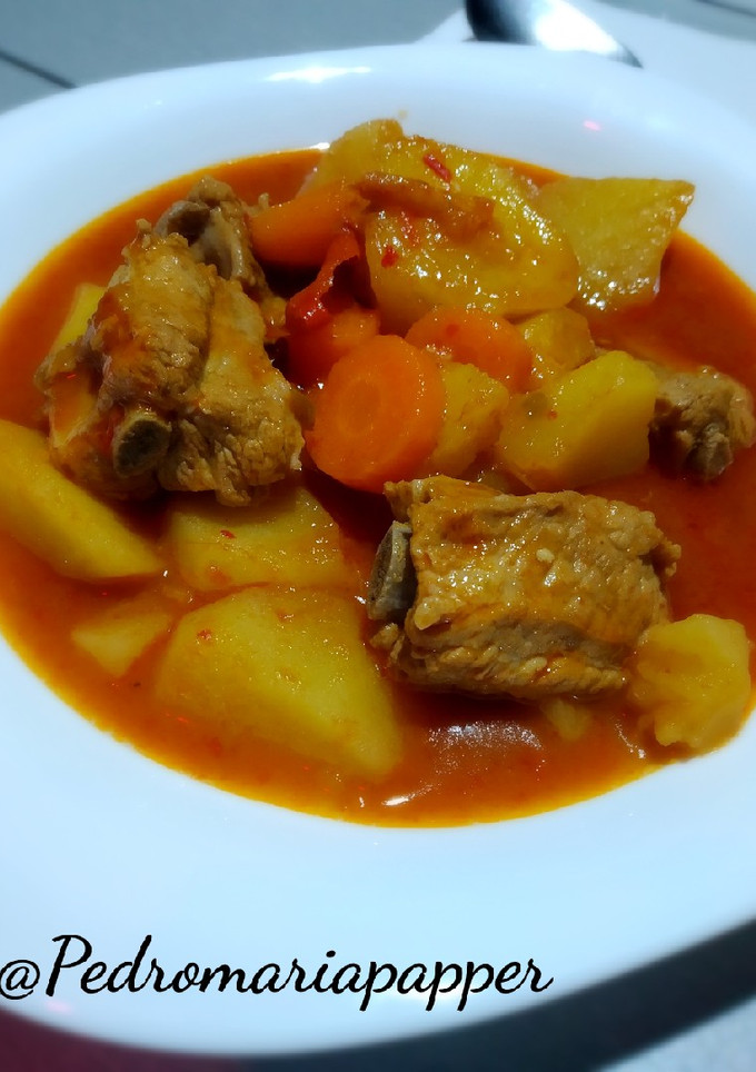 Una foto de Costillas de cerdo con patatas.(Thermomix TM5)
