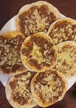 Una foto de Mini pizzas en la sartén🍕