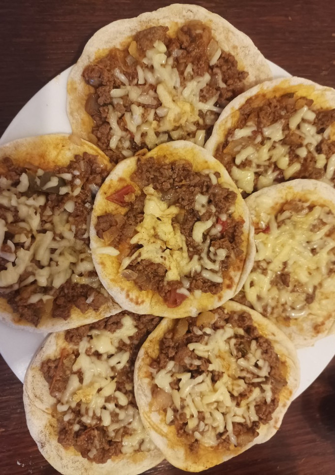 Una foto de Mini pizzas en la sartén🍕