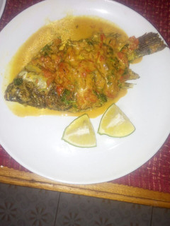 A picture of Tilapia in coconut sauce.