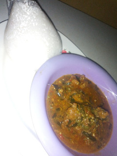 A picture of Tuwon shinkafa with okro soup.