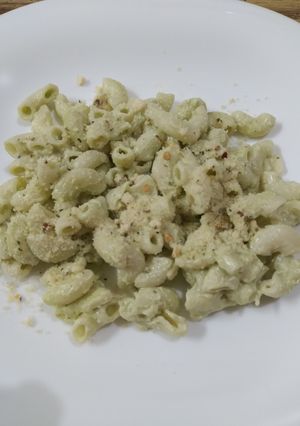 Una foto de Pasta con crema de cilantro