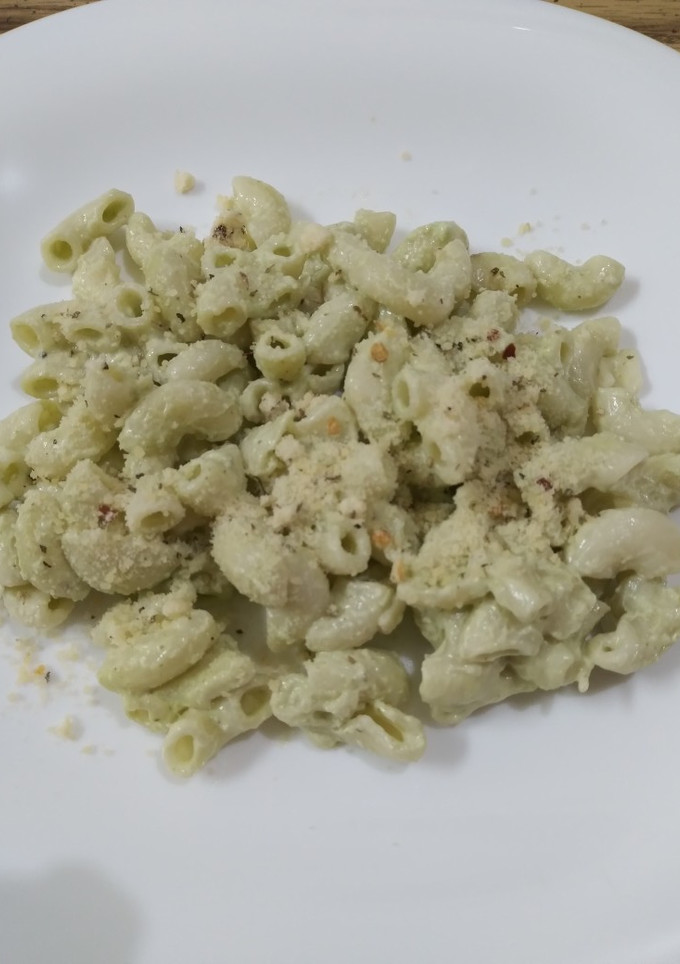 Una foto de Pasta con crema de cilantro
