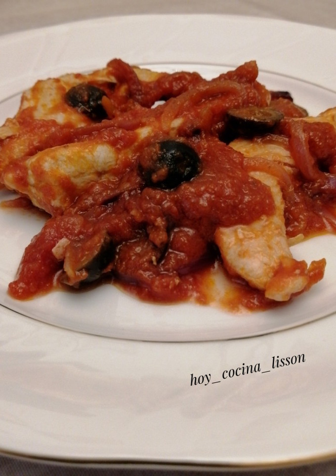 Una foto de Pollo picante con tomate