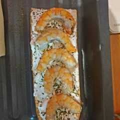 Una foto de Tosta de alioli y gambas