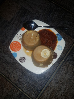 A picture of Moi Moi With Egg And Crayfish.