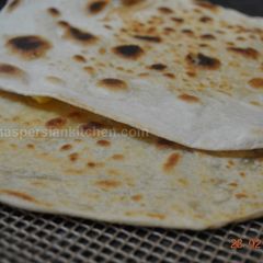 A picture of Flat  Naan  Bread نان تافتون.