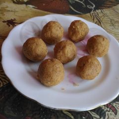 A picture of Besan ladoo in microwave.
