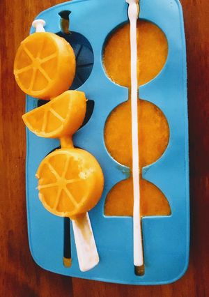Una foto de Helados de mandarina al agua