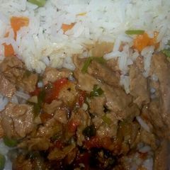 A picture of Sossi Stew with Rice.