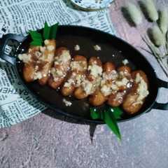 รูปของ Pisang karamel toping blondo santan / mata ula
