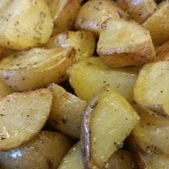 A picture of Rosemary-Honey Roasted Potatoes.
