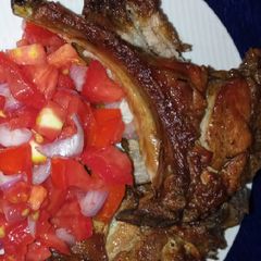 A picture of Pan fried pork chops.