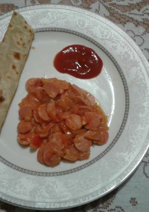 Una foto de Salchichas entomatadas 😍