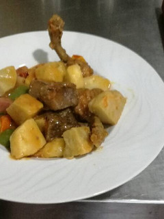 Una foto de Salteado de ternera y pollo con Málaga