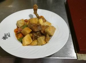 Foto principal de Salteado de ternera y pollo con Málanga
